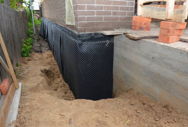 SJ Waterproofing Pros technician performing targeted Waterproofing assessment in Vandalia, MI